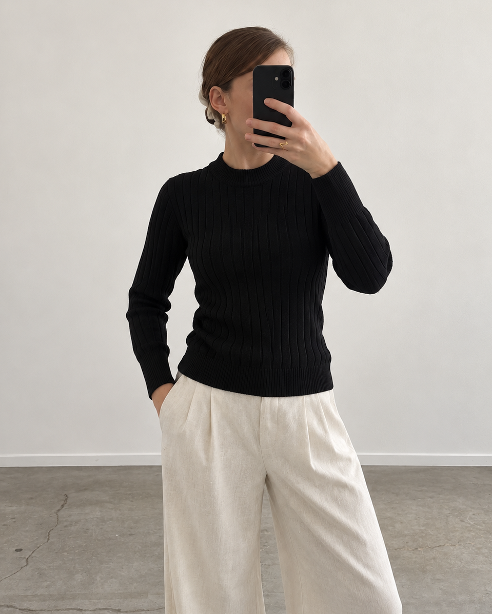 Black ribbed sweater (s)