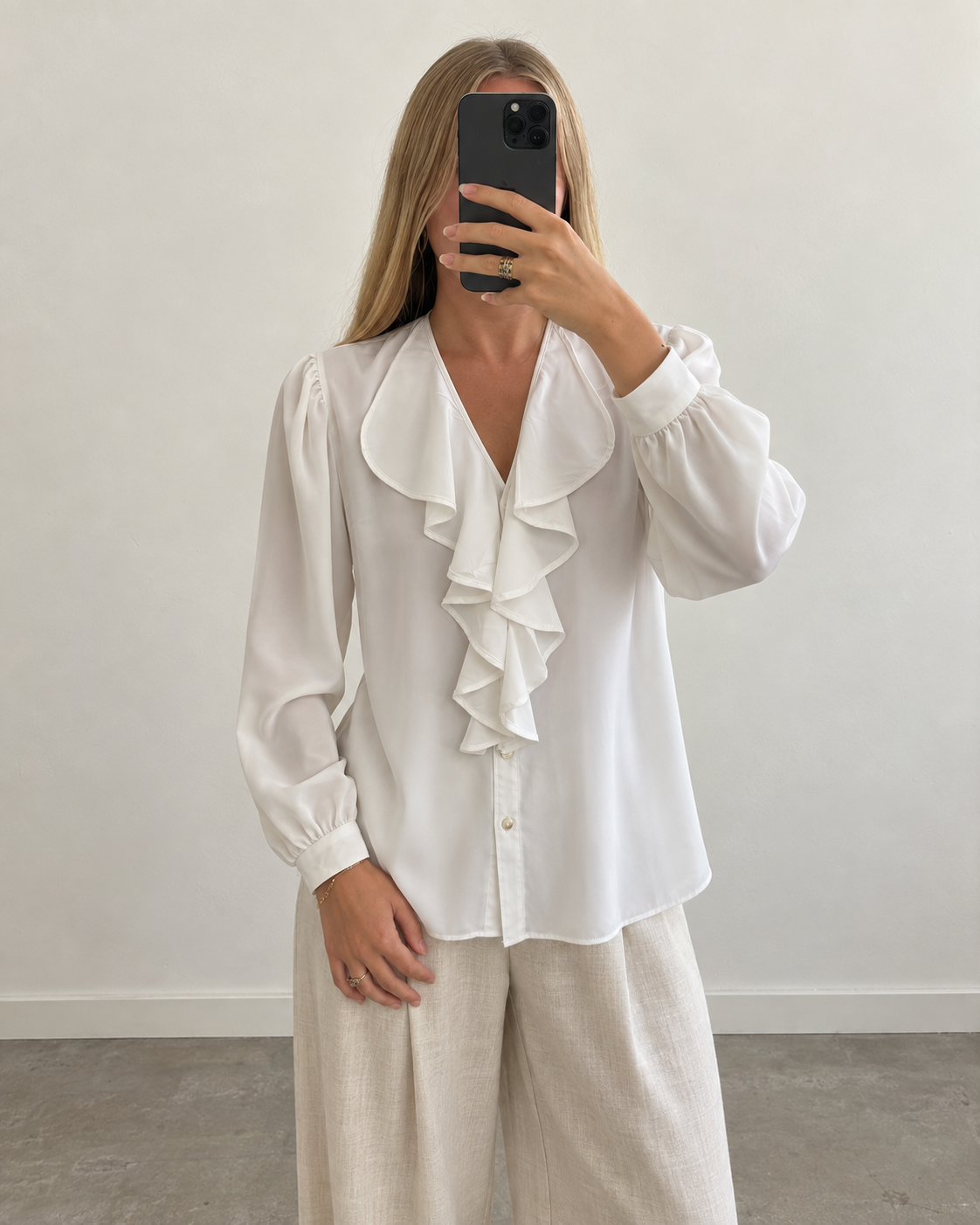 White ruffle blouse (m)